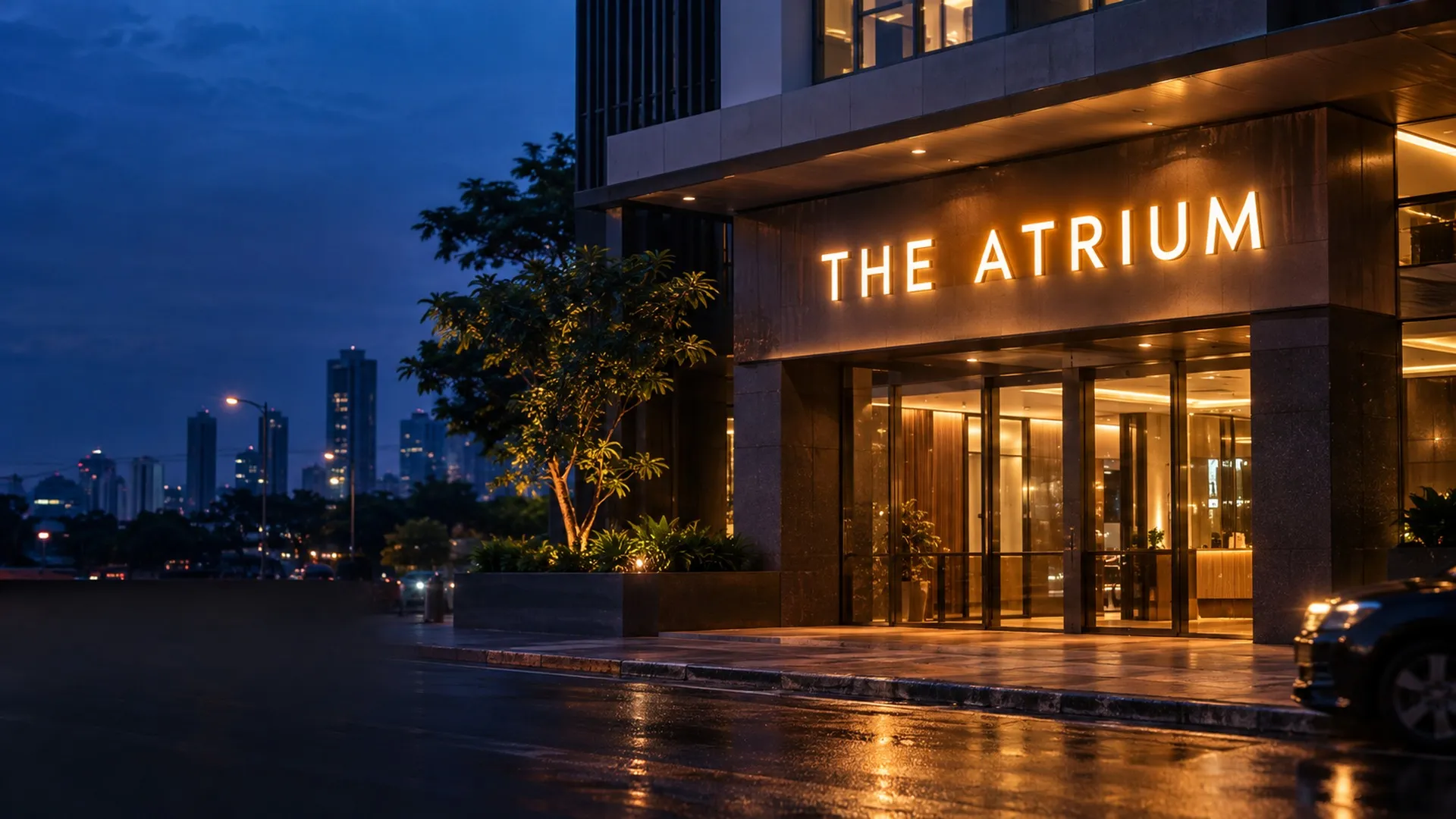 Illuminated corporate signage on a commercial building at dusk